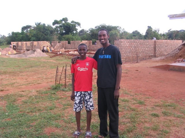 Moses and Isaac--in the background is the construction of the 6 new classrooms!